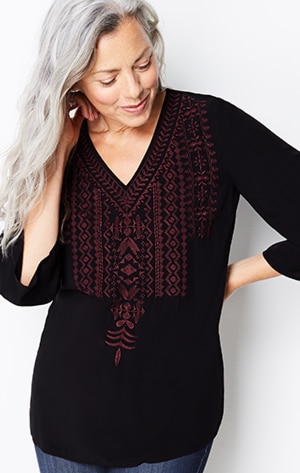 Shop our embroidered bell-sleeve top
