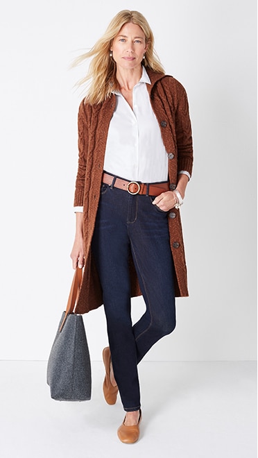 Shop this look—cozy cabled button-front cardi, classic white shirt, high-rise straight-leg jeans, and winter’s day tote