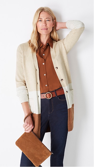 Shop this look—color-block button-front cardi, relaxed washable-silk shirt, high-rise straight-leg jeans, and convertible crossbody bag