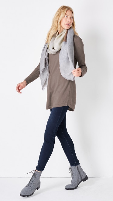 Shop this look—Naomi lace-up boot, highland V-neck sweater tunic, soft ultra stretch denim leggings and double faced fringe trimmed scarf