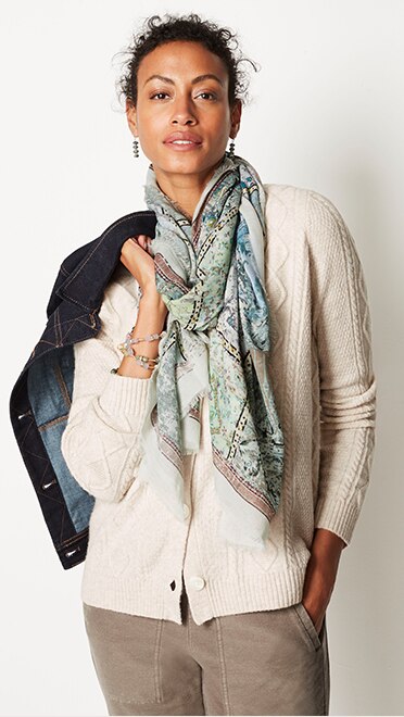 Shop this look—cropped cabled V-neck cardi, classic denim jacket, adagio garment-dyed knit pants and painterly block-print scarf