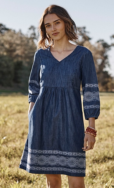 Shop our embroidered indigo peasant dress, Pure Jill sunset dunes statement bracelet, Born® Iwa woven sandals and sterling silver hoops