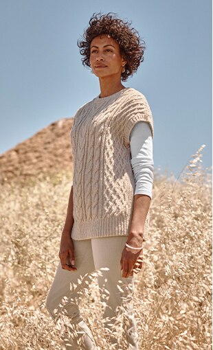 Shop our cabled sweater vest, pima crew-neck longe-sleeve tee, brushed bi-stretch twill pants and sterling silver bangles