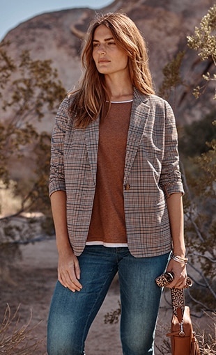 Shop our Sedona plaid blazer, layered tee, high-rise boot-cut jeans and tassled leather camera bag