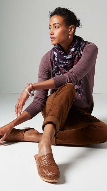 Shop our pull-on corduroy boyfriend jeans, everyday V-neck pullover, cotton & silk tasseled scarf and Cameron studded clogs