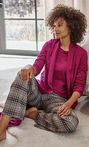 shop our Sleep Ultrasoft shawl-collar robe, Sleep Ultrasoft crew-neck top, Sleep Ultrasoft relaxed full-leg pants and UGG® maxi curly slide slippers