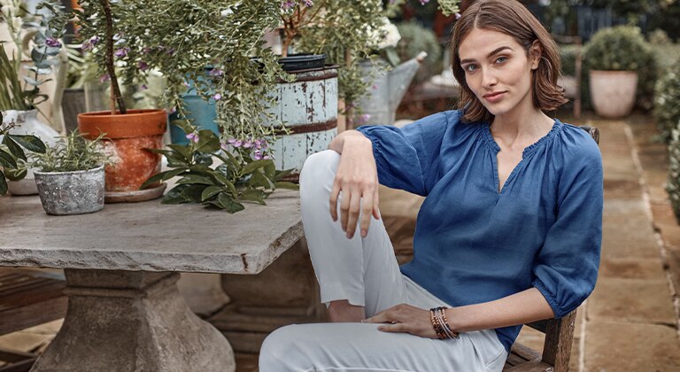 Shop our linen relaxed peasant top, essential cotton-stretch pants, earth tones beaded bracelet and sterling silver bangles