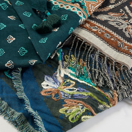 Shop our scarves & ponchos