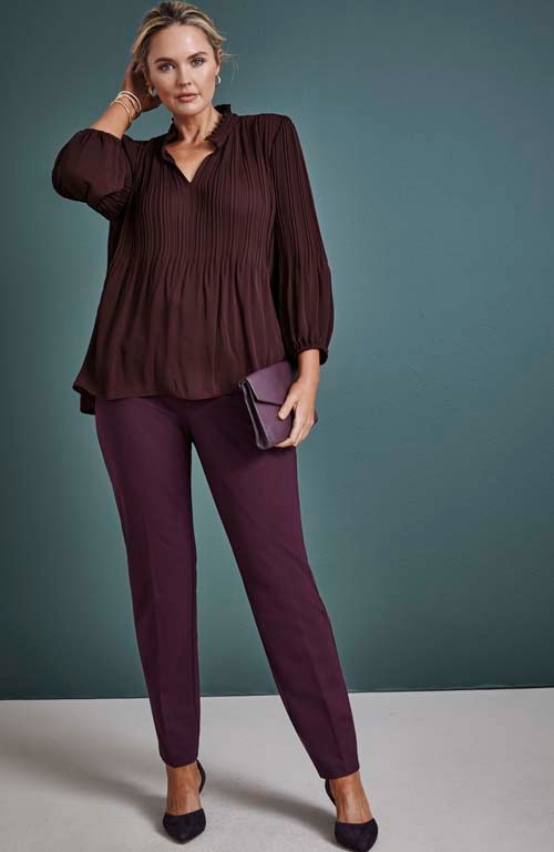 Shop our pleated ruffle-neck top