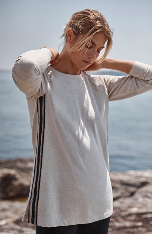 Shop our fit french terry crochet tunic