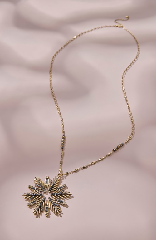 Shop our goldtone snowflake pendant necklace