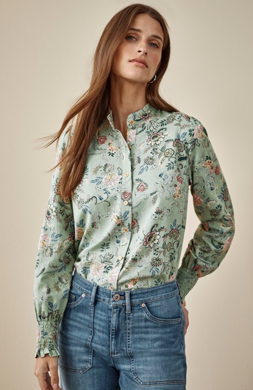 Shop our ruffled-neck blouse