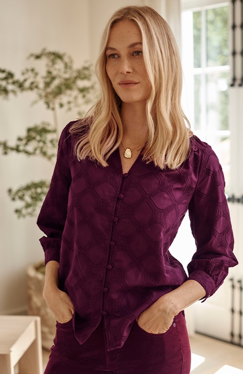 Shop our embroidered button-front top