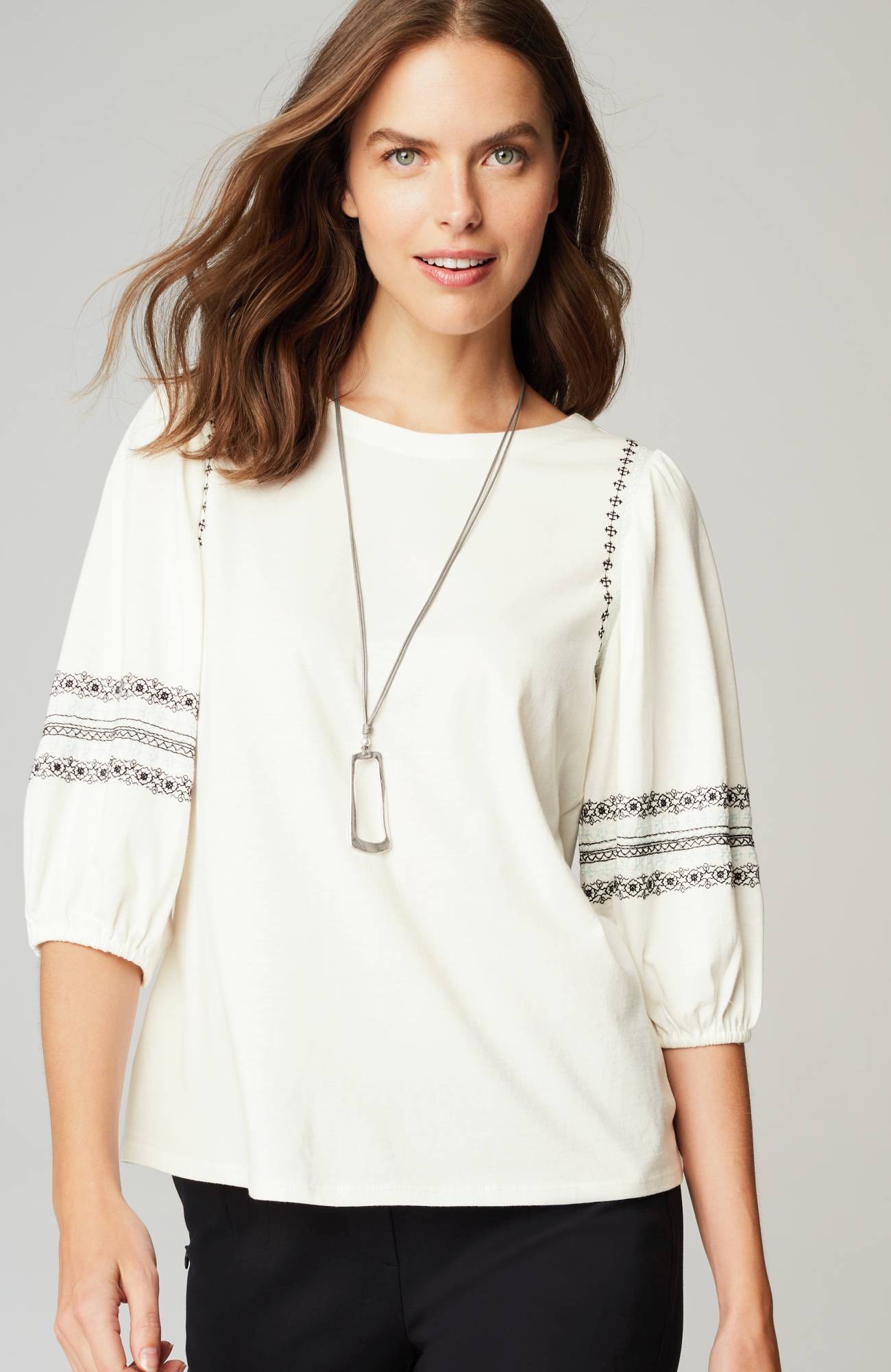 geometrically embroidered top