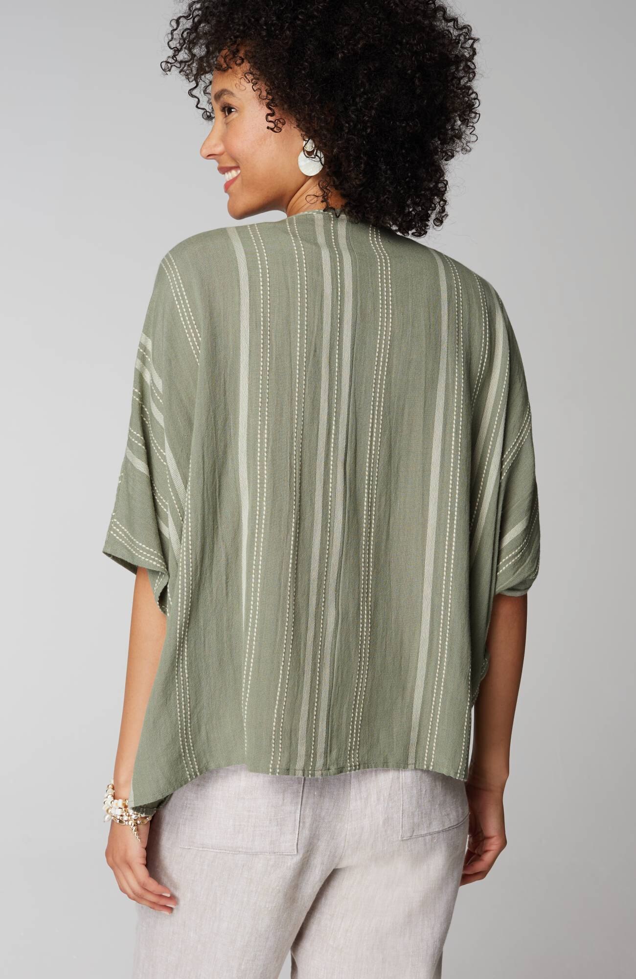 twisted-front poncho