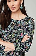 bird-printed boat-neck top