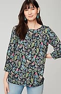 bird-printed boat-neck top