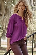 woven-trimmed knit top