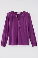 woven-trimmed knit top