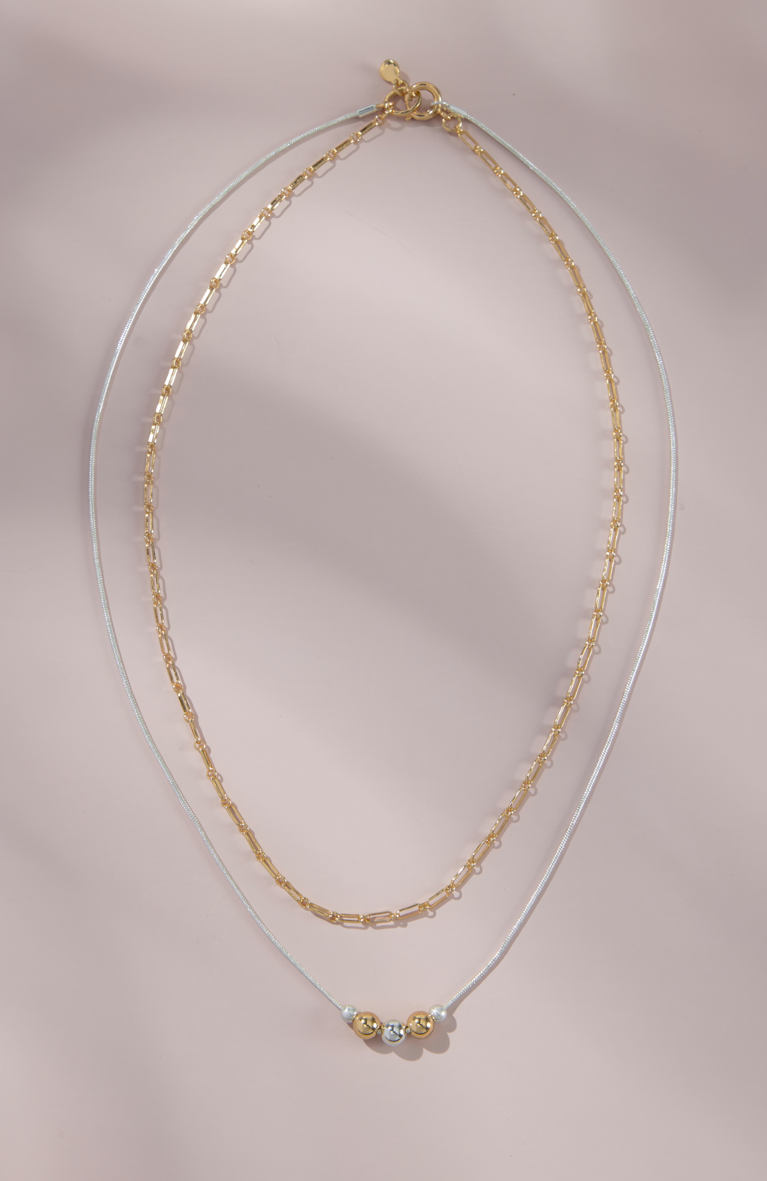 delicate mixed-metals necklace