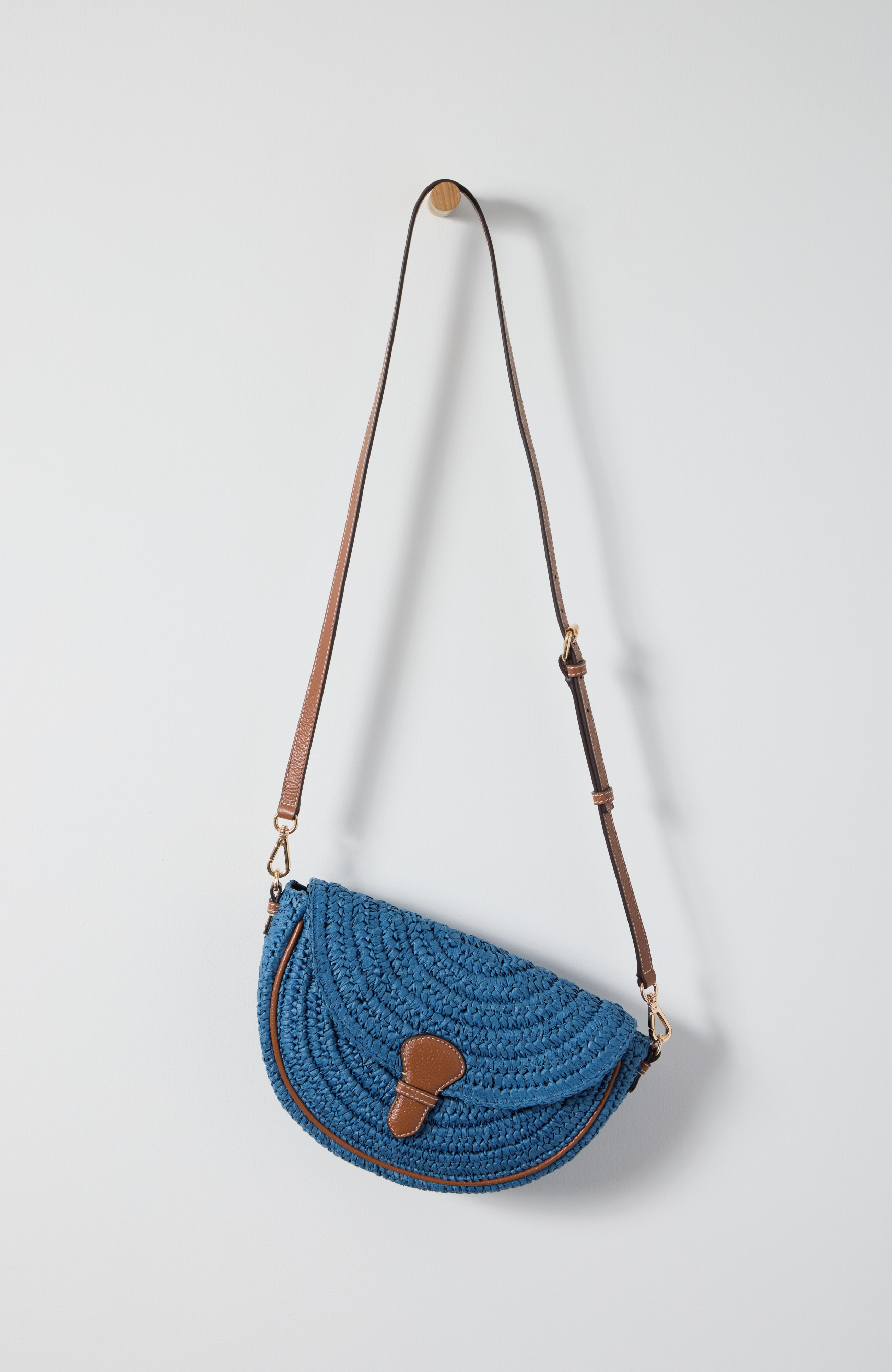 straw half-moon crossbody