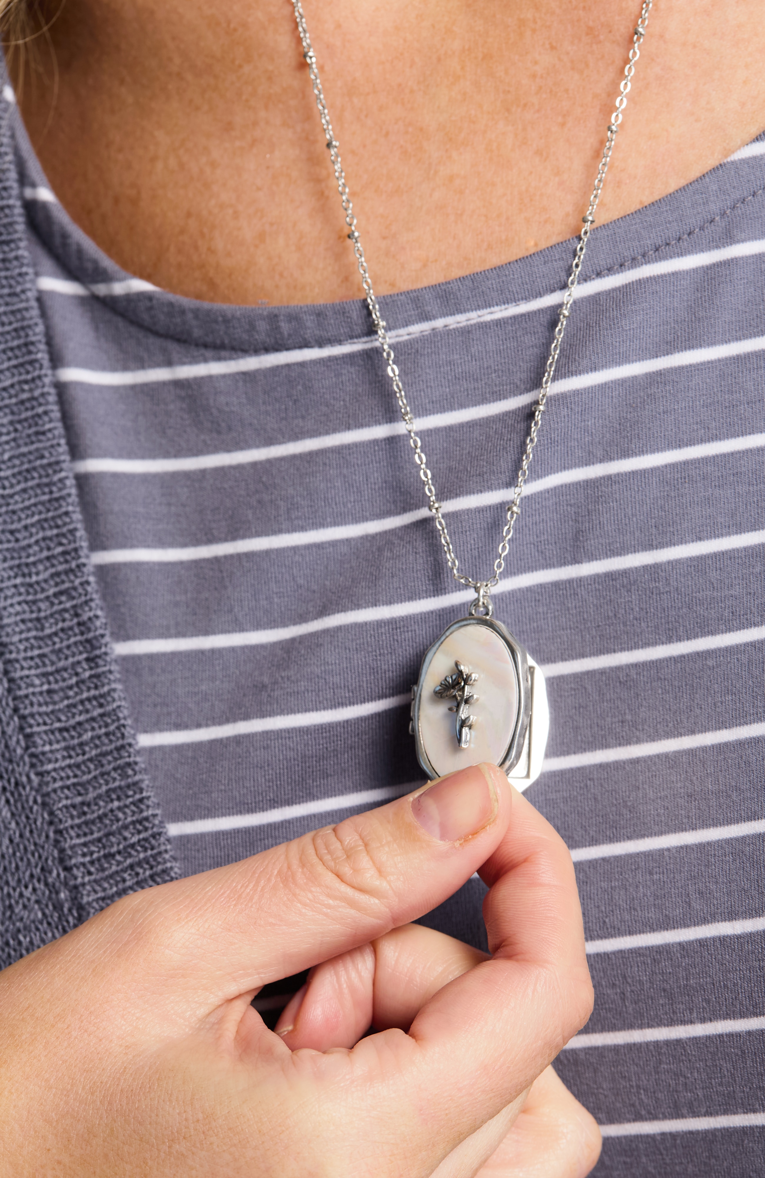 compassion fund mother-of-pearl locket
