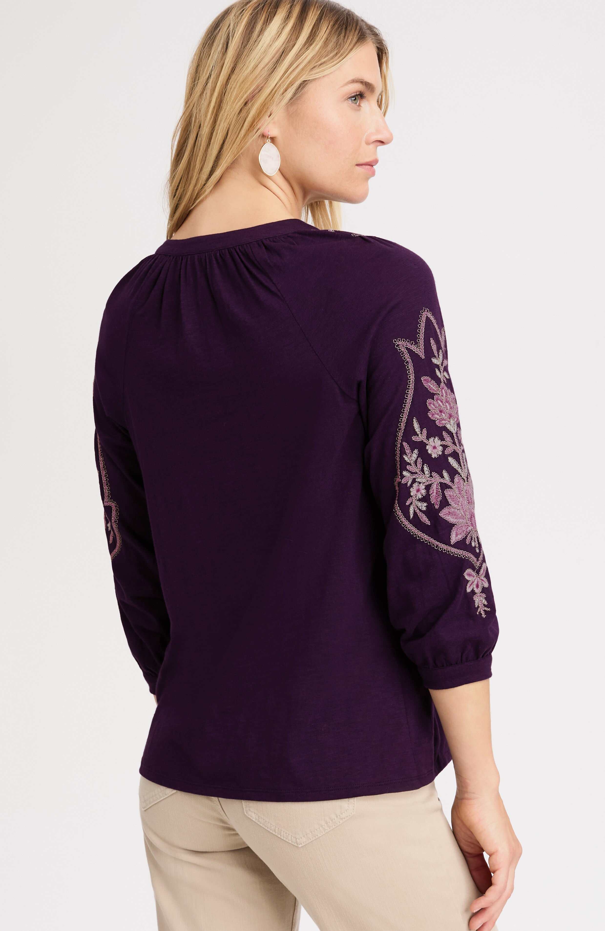 feminine floral-embroidered top
