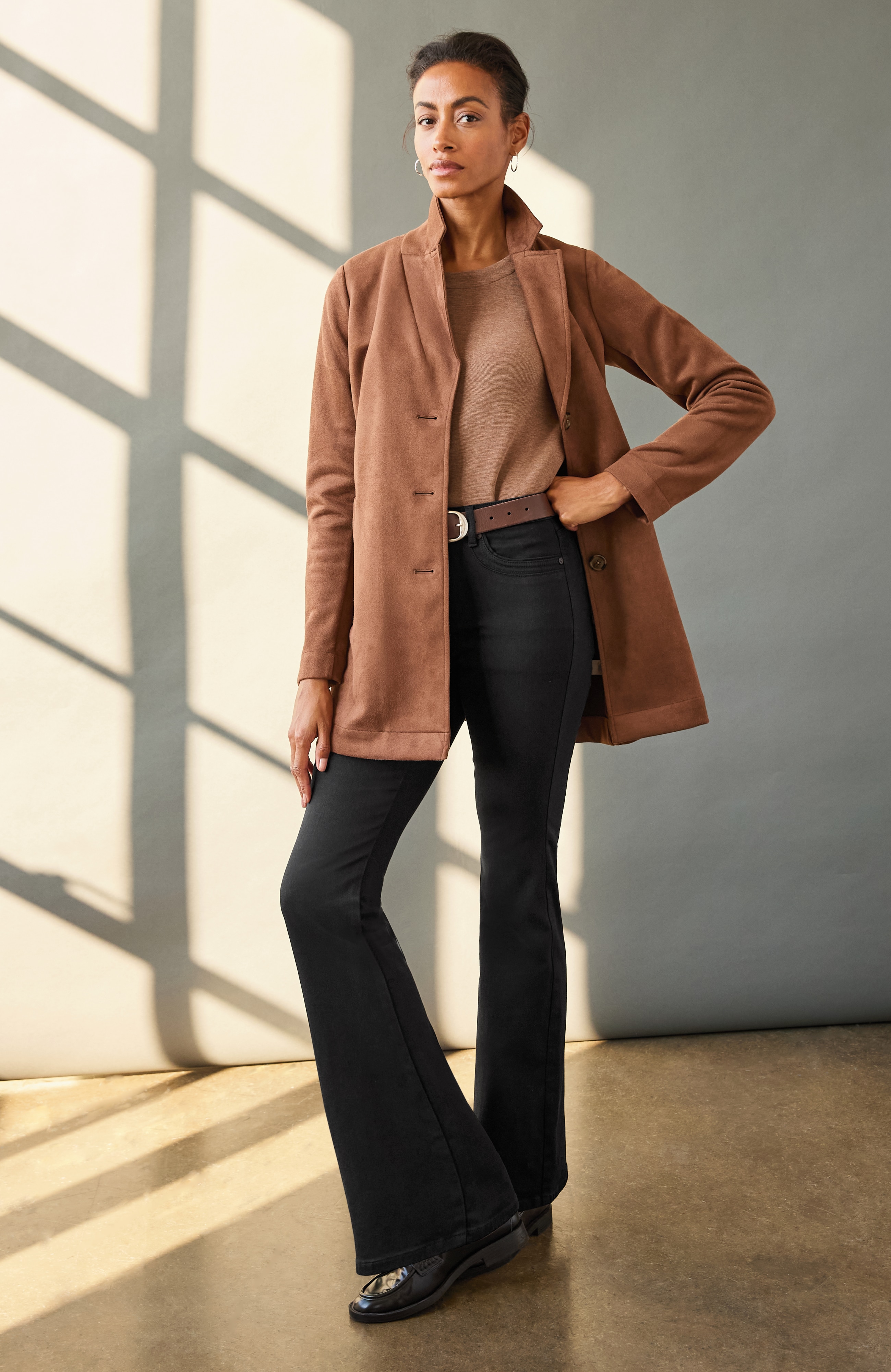 high-rise curved-pocket flare jeans