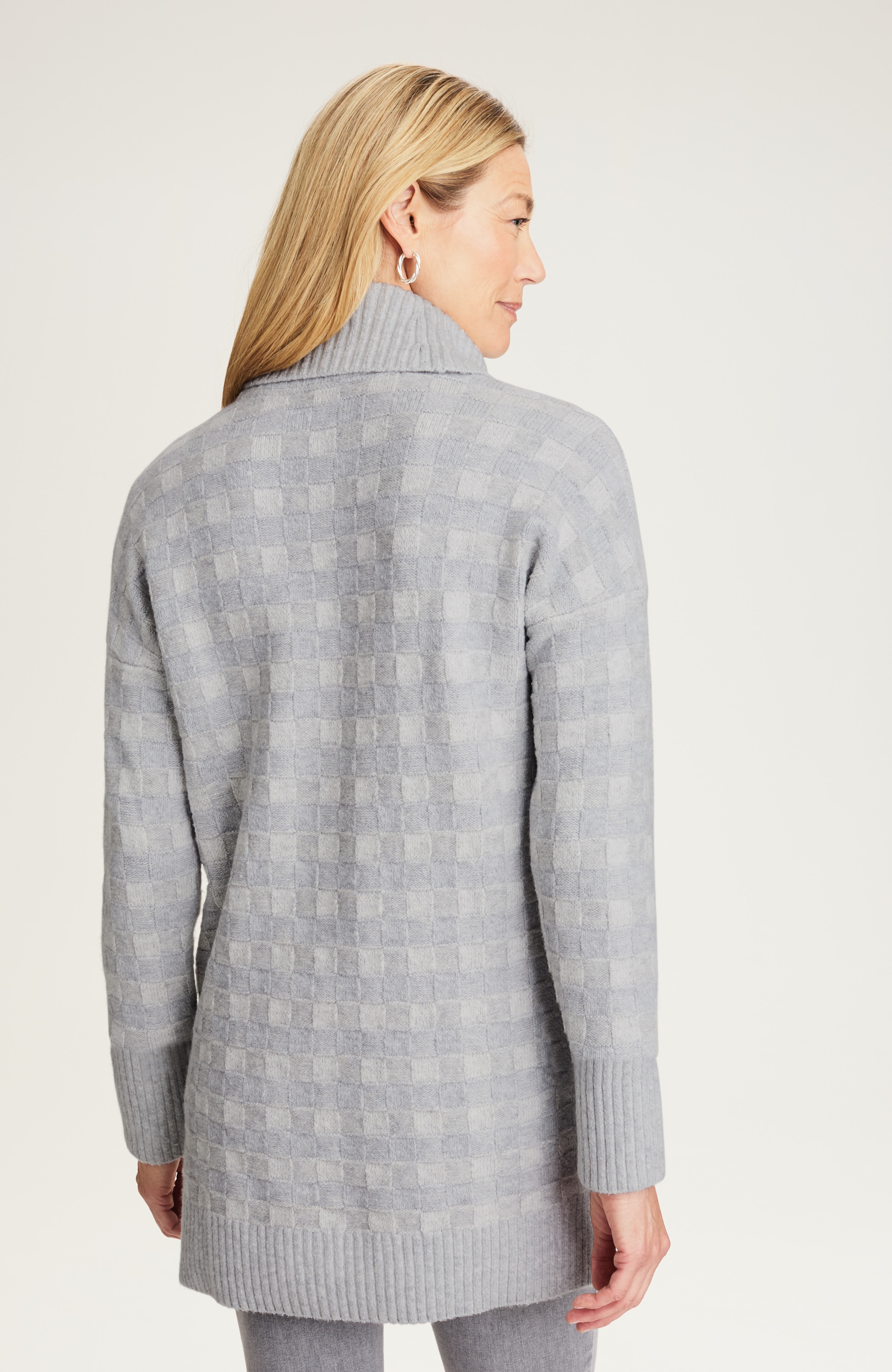 checkered turtleneck sweater