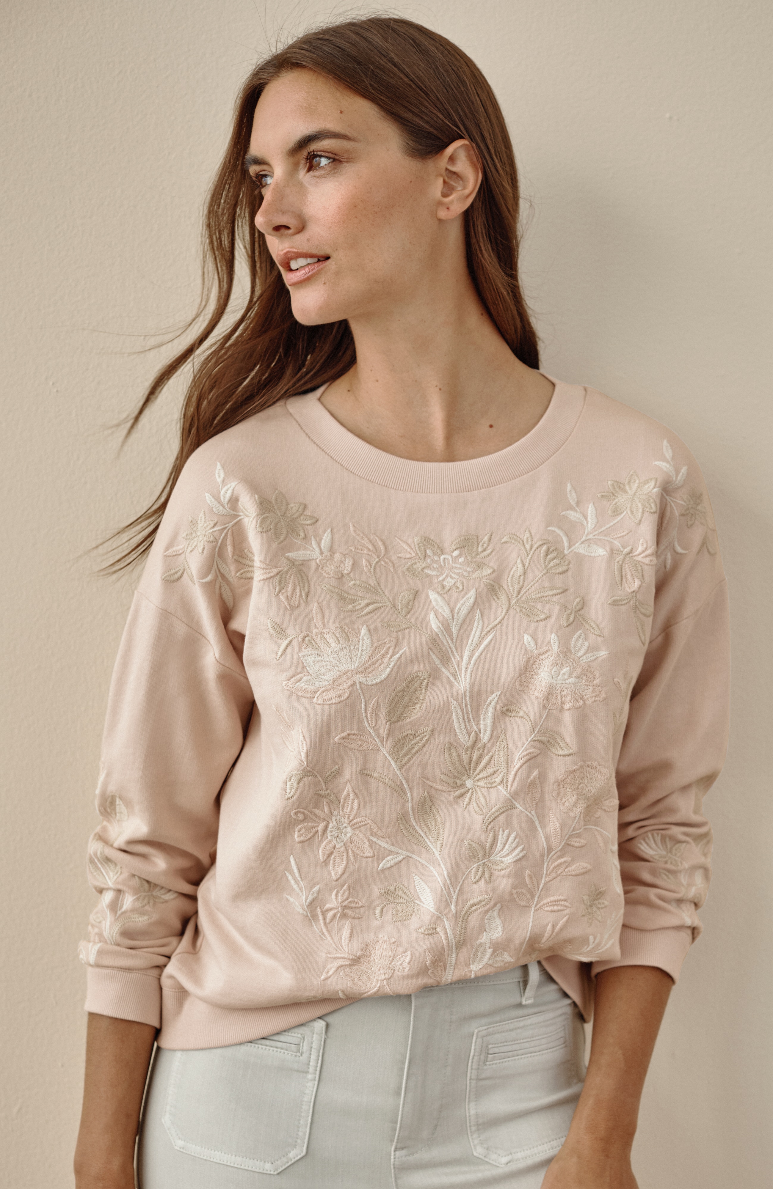 intricately embroidered sweatshirt