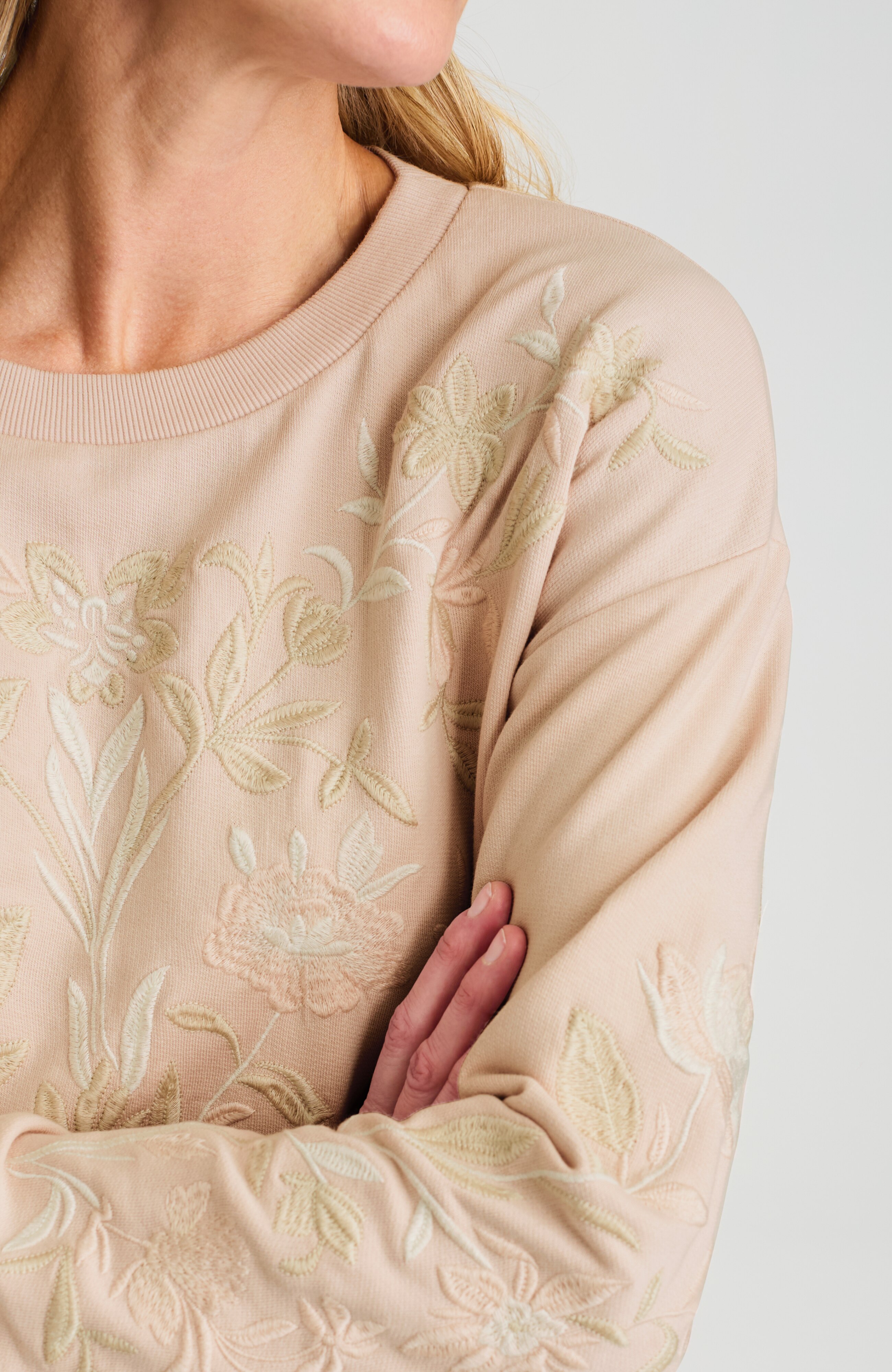 intricately embroidered sweatshirt