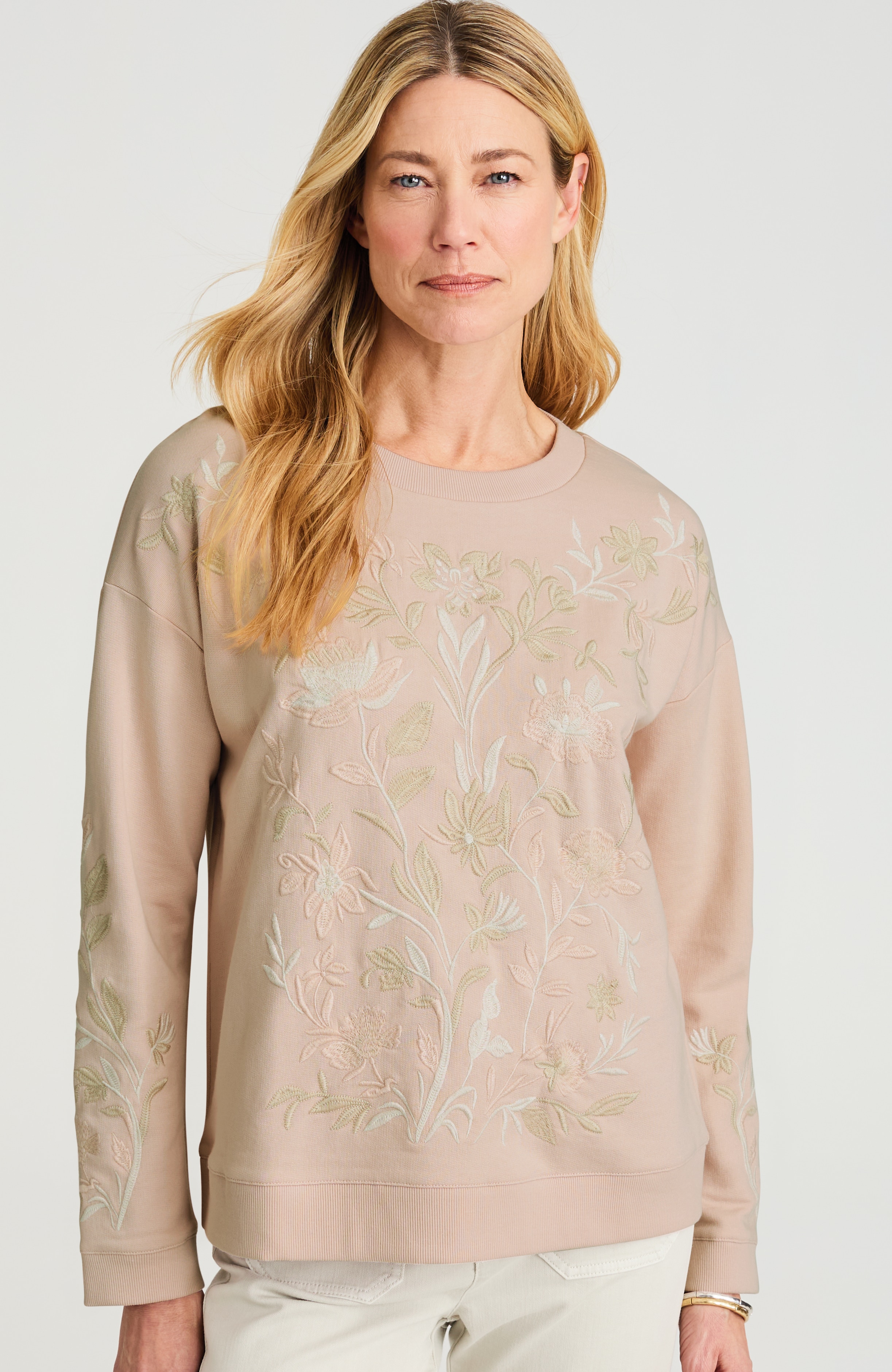 intricately embroidered sweatshirt