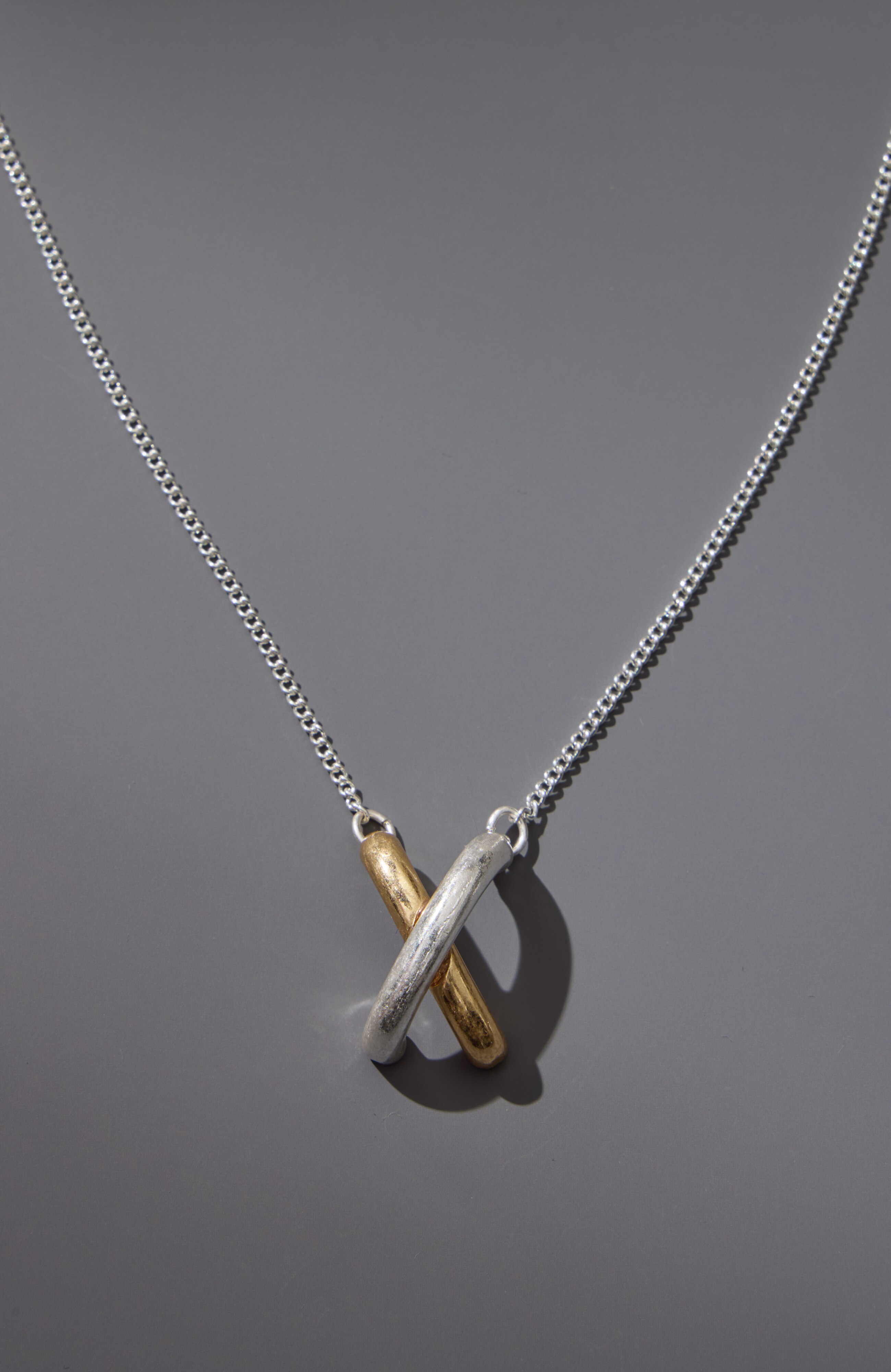 modern elements crisscross necklace
