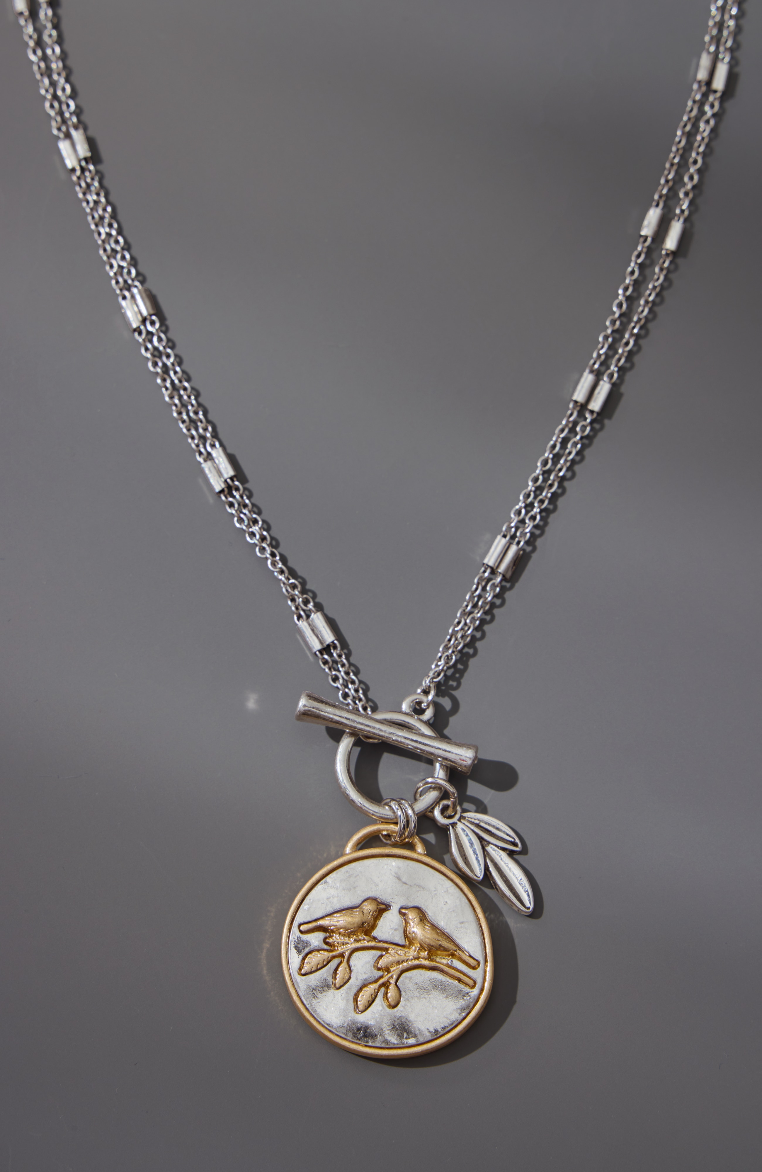 compassion fund convertible bird necklace