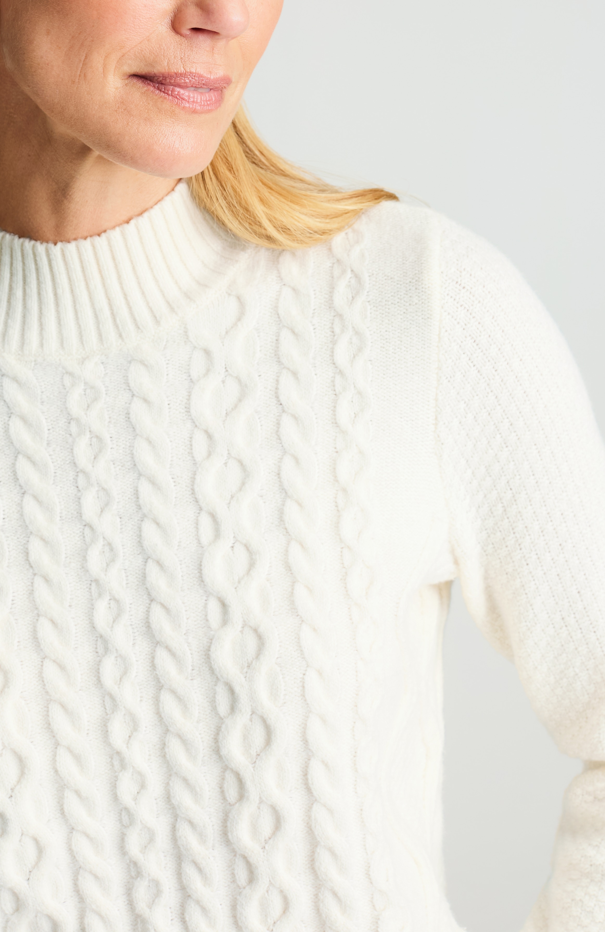 cabled mock-neck sweater