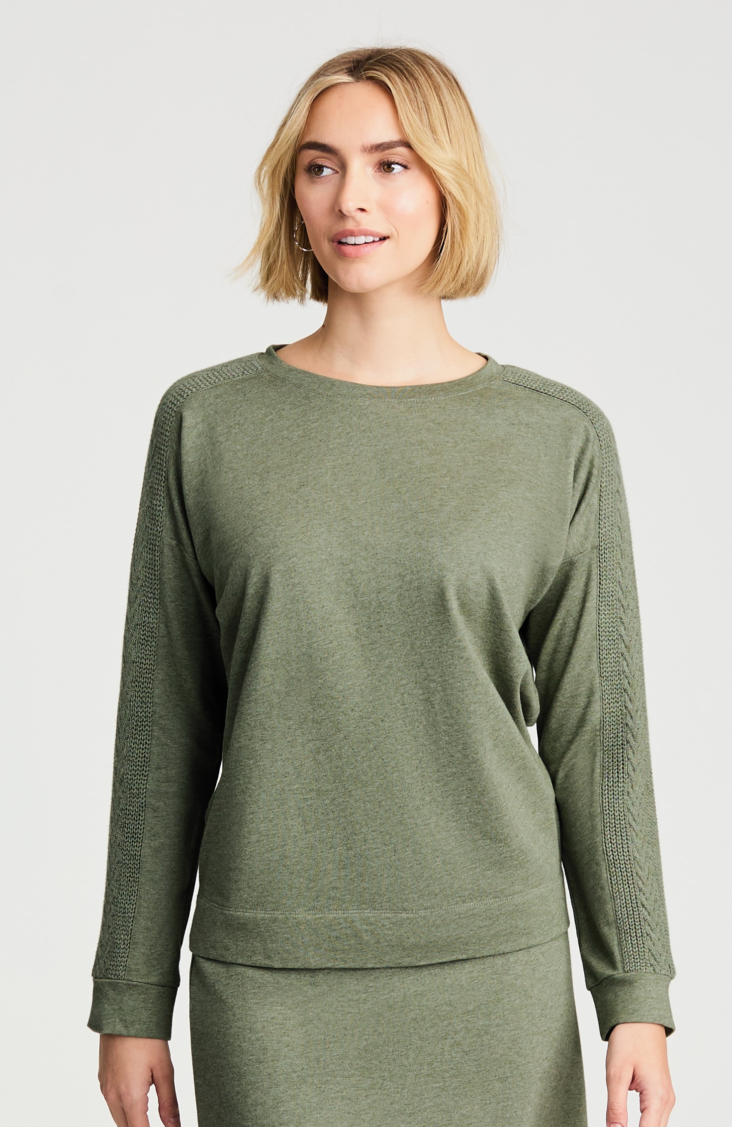 sweater-trimmed sweatshirt