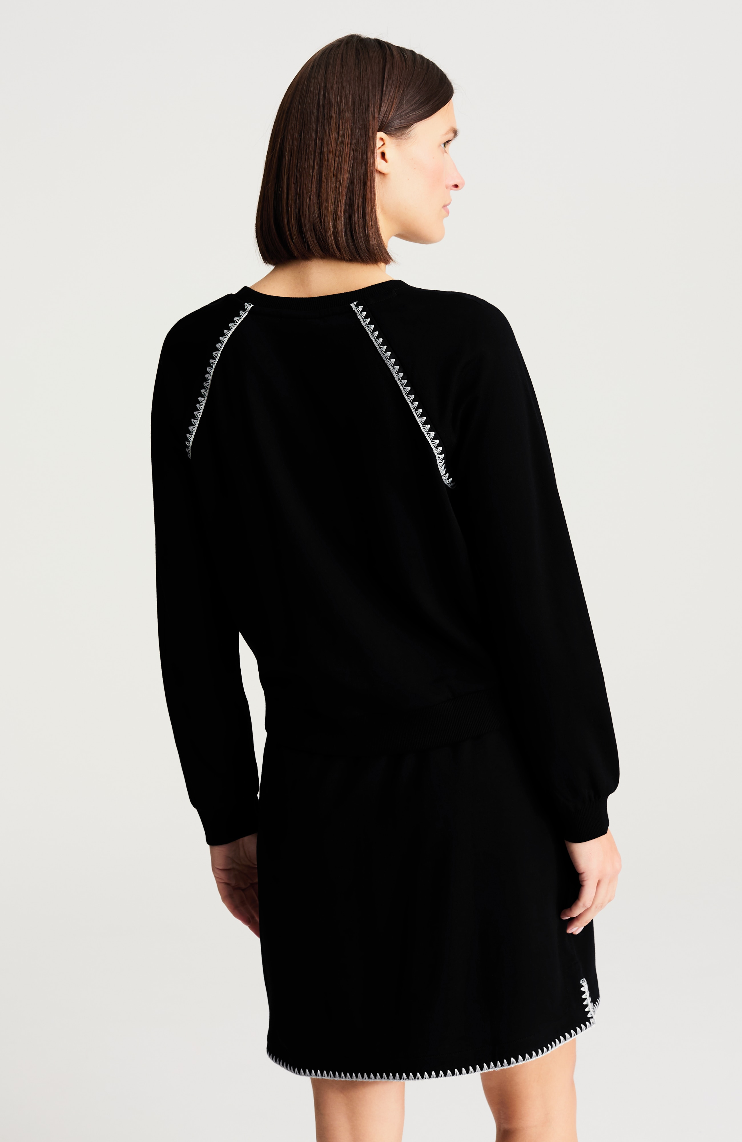 fit whipstitched pullover