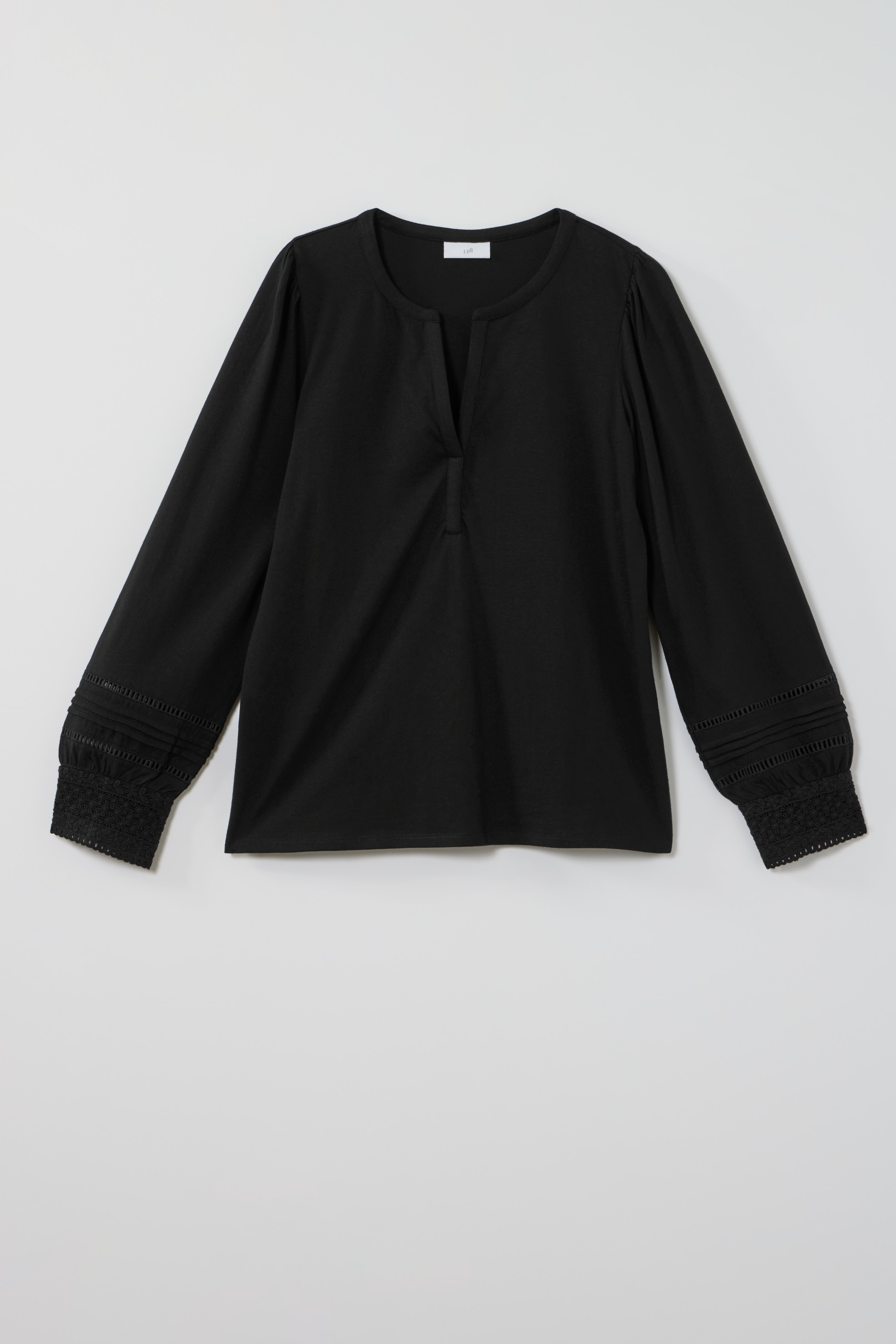 lace-trimmed long-sleeve top