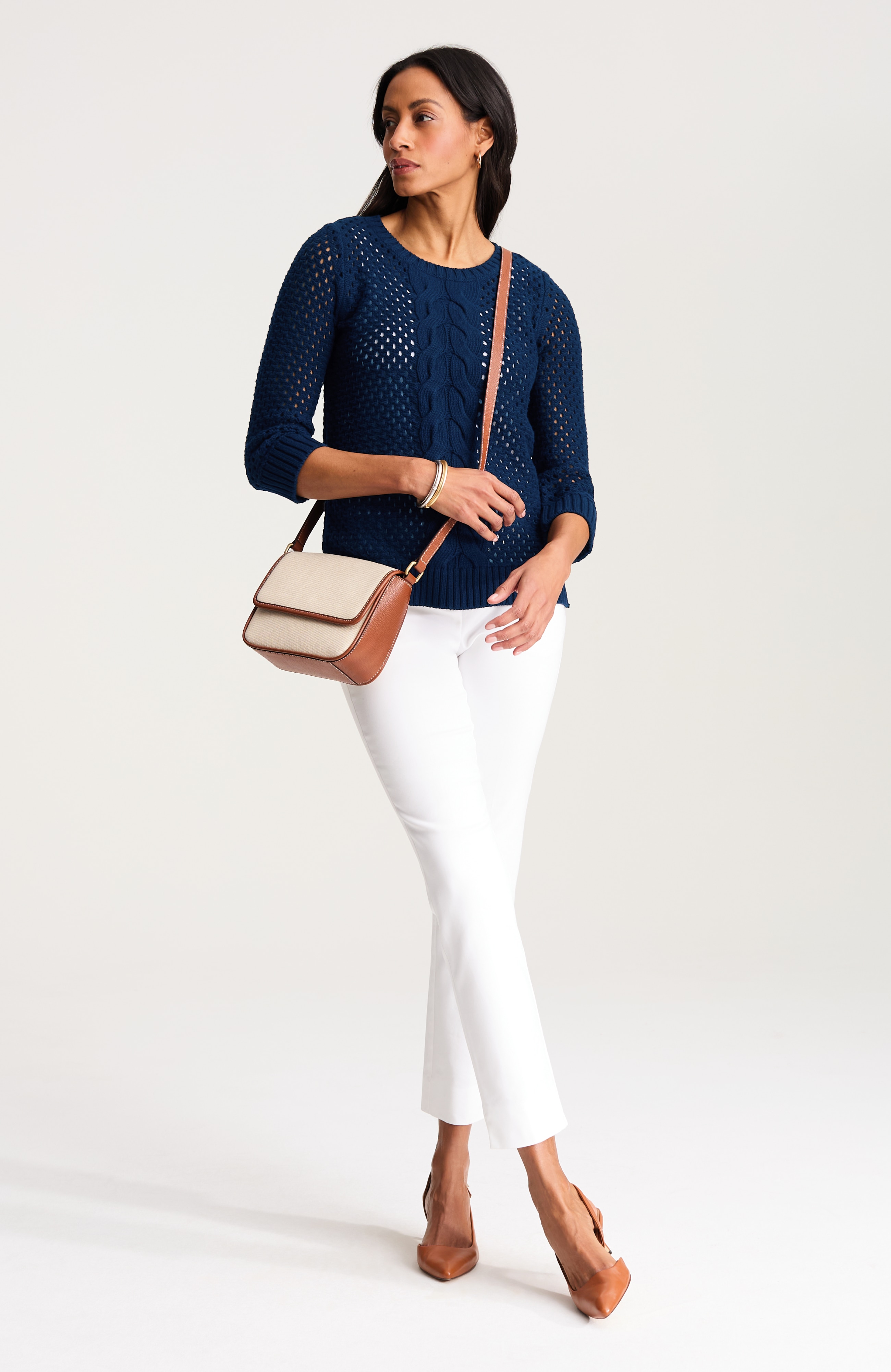 open-knit cabled sweater