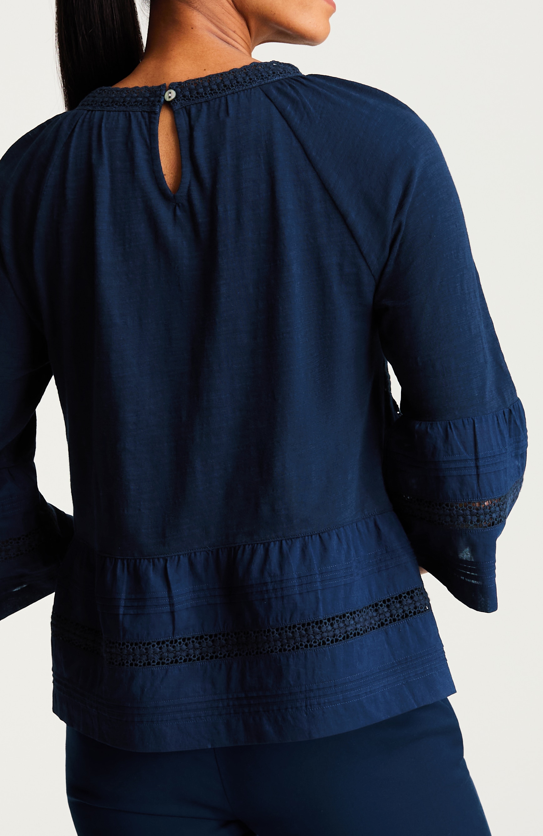 eyelet mixed-media top