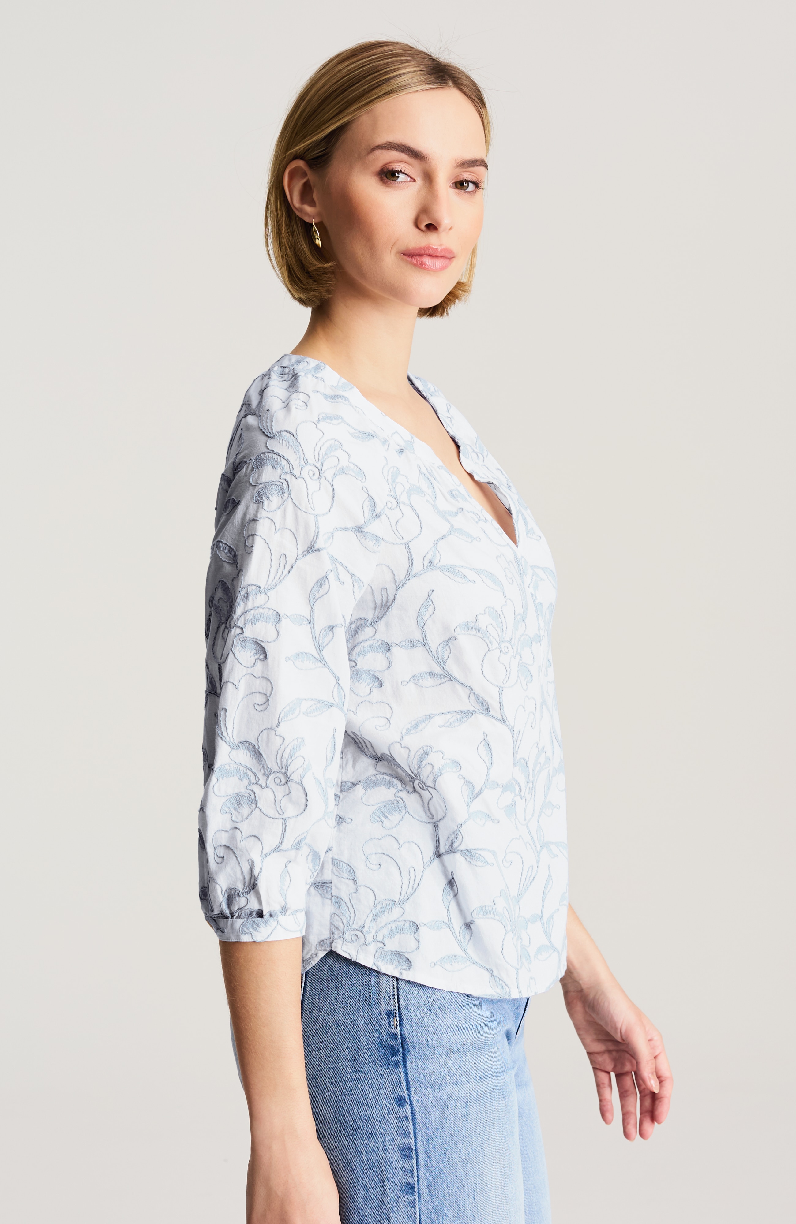 floral-embroidered peasant top