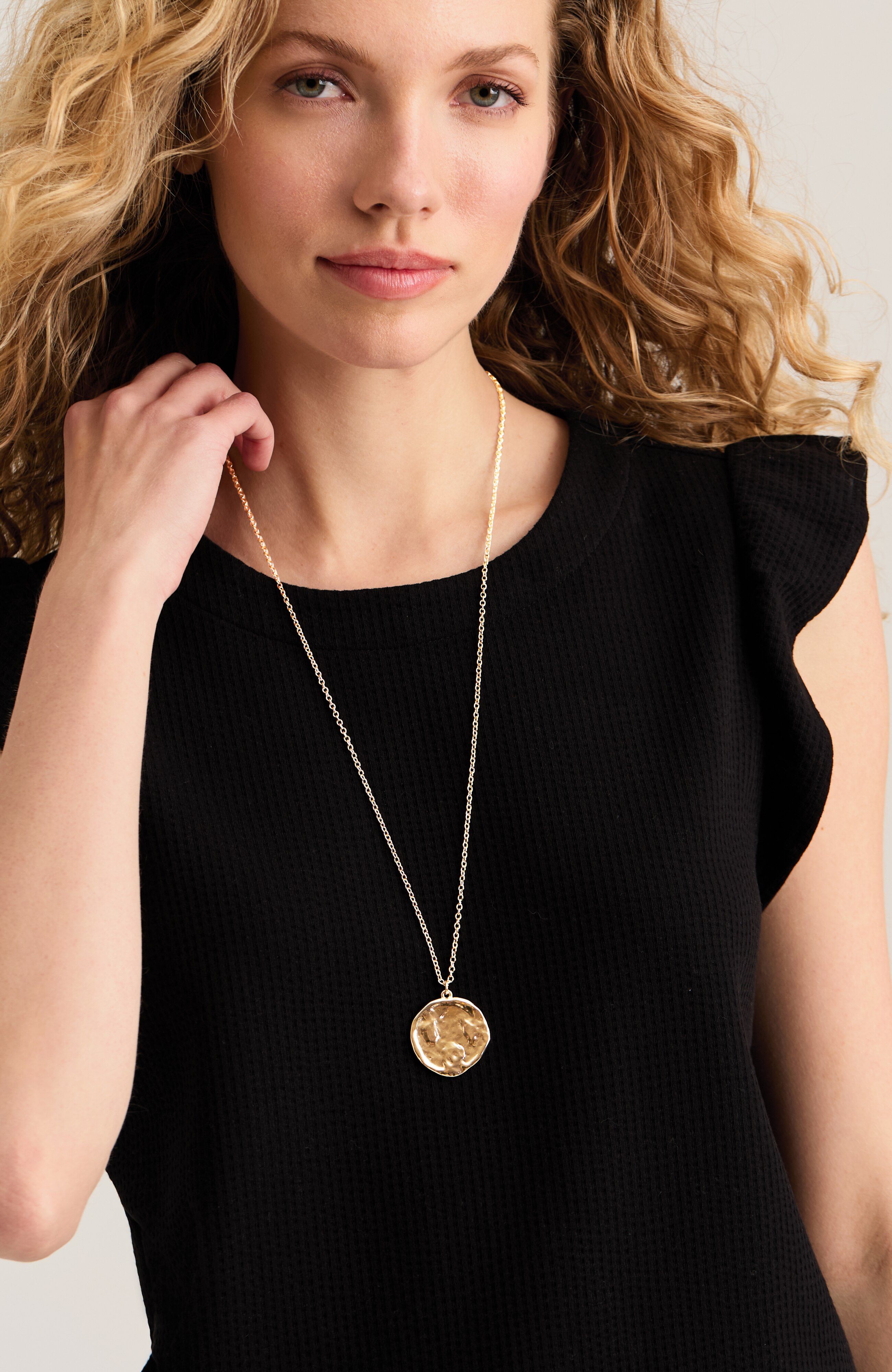 hammered coin pendant